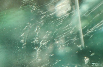 Two-phase inclusions in emerald deposits (area of Emerald mines, the Urals). View mode - dark lighting.