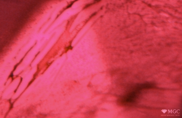 Two-phase inclusions in heat-treated ruby. View mode - dark lighting.