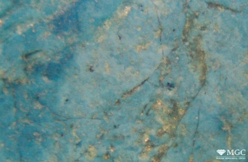 Turquoise imitation - coloring of vein rock with blue dye. View mode - reflected light.