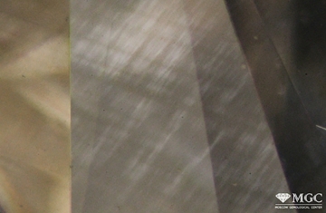 A tatami-type structure in a natural type II diamond subjected to HPHT-refining. Viewing conditions - polarized light, nicknames +.