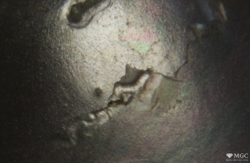 The appearance of the surface on imitation pearls. View mode - reflected light.