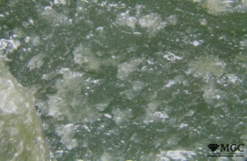 The characteristic surface of jade in the fracture. View Mode - reflected light